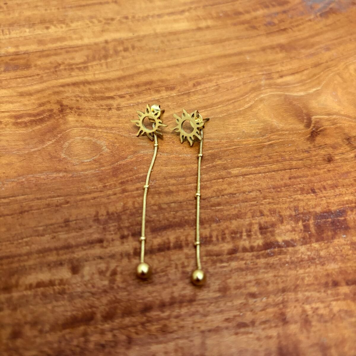 img_4071 Boucle d’oreille soleil pendante