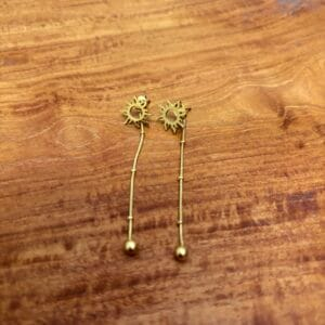 img_4071 Boucle d’oreille soleil pendante